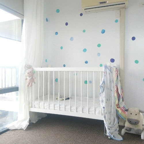 The cot wall from the reading chair with the stickers attached. 